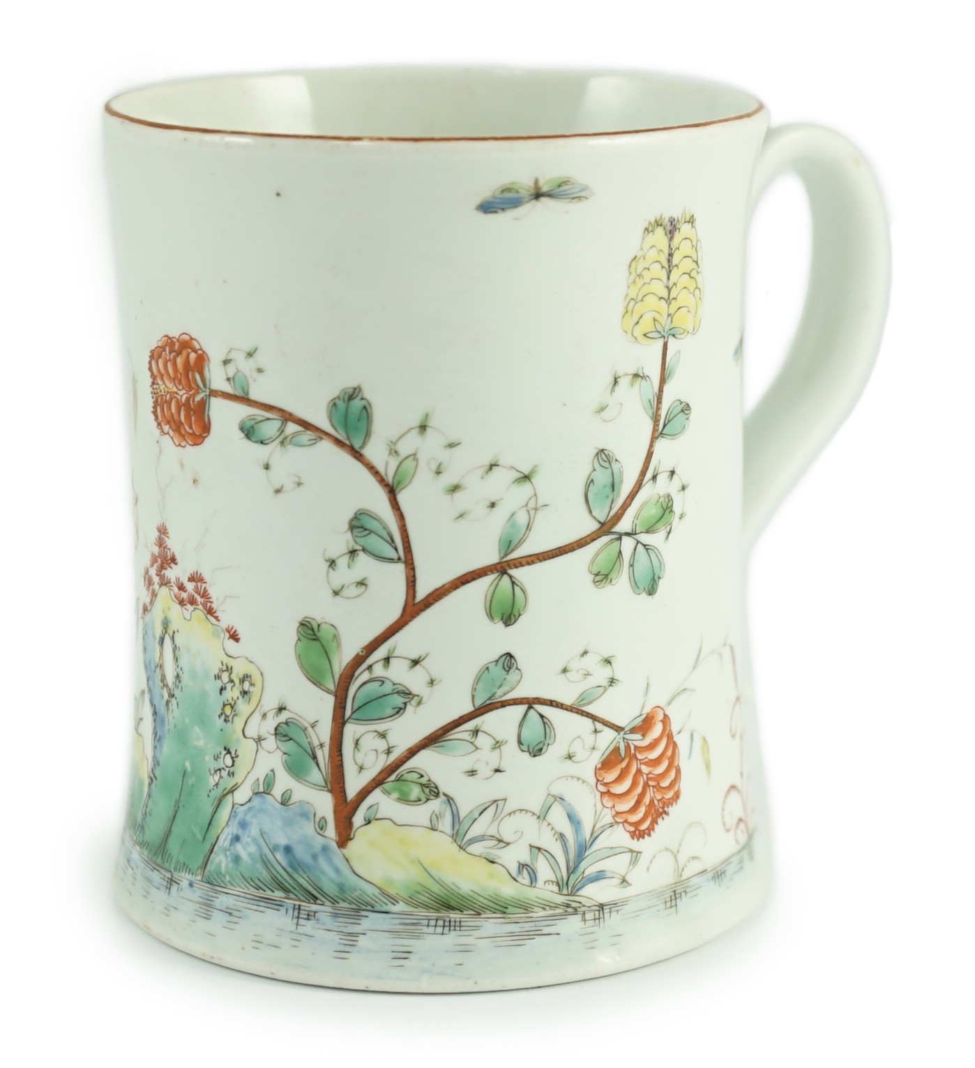 A rare Worcester polychrome 'flower and rockwork' small mug, c.1753-54, 9cm high